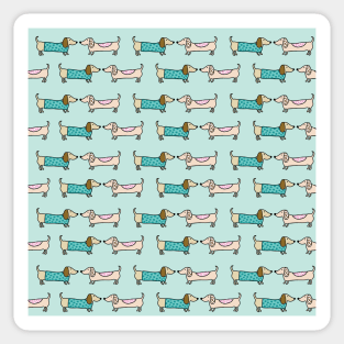 Cute dachshunds in light blue background Sticker